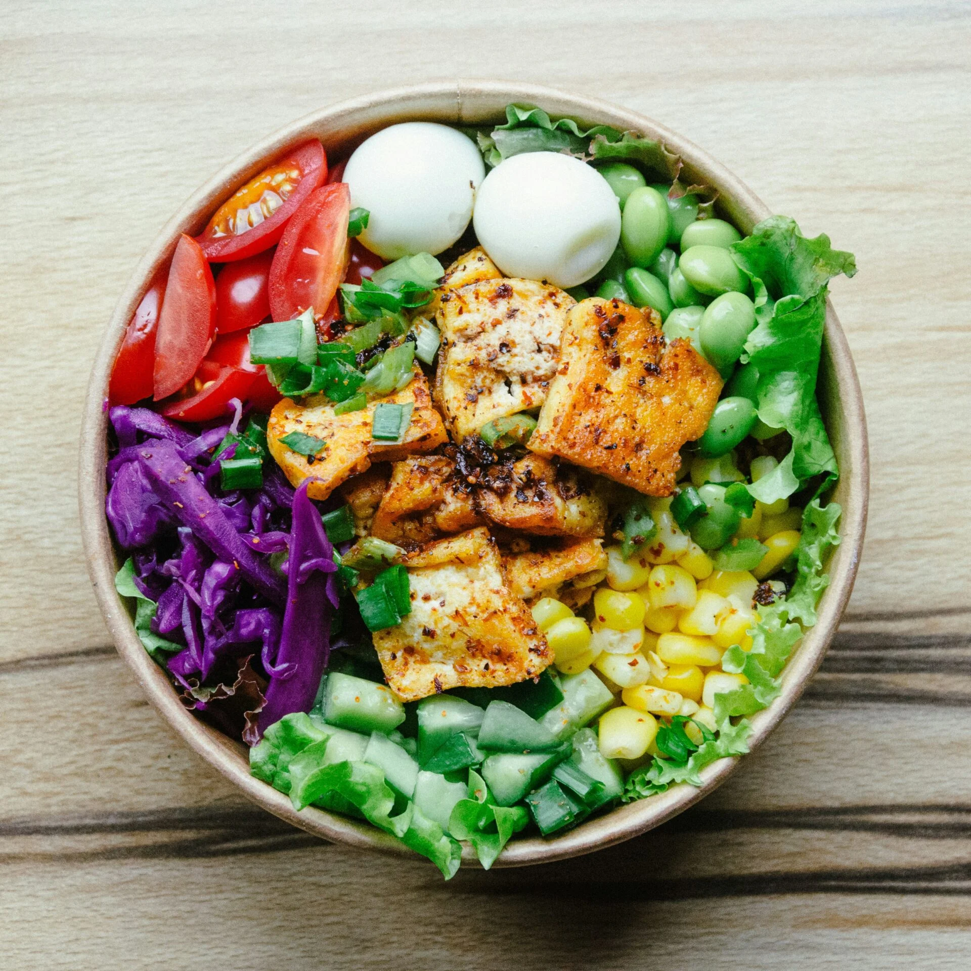 Tofu and salad healthy lunch rich in Vitamin K