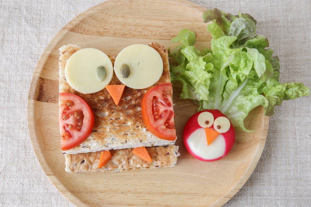 sandwich and fruit in the shape of birds